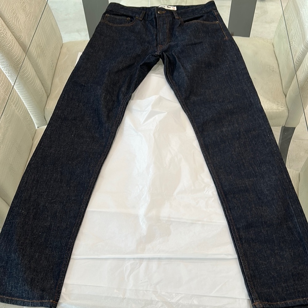 Lacoste men’s jeans  slim fit  32x34 never worn